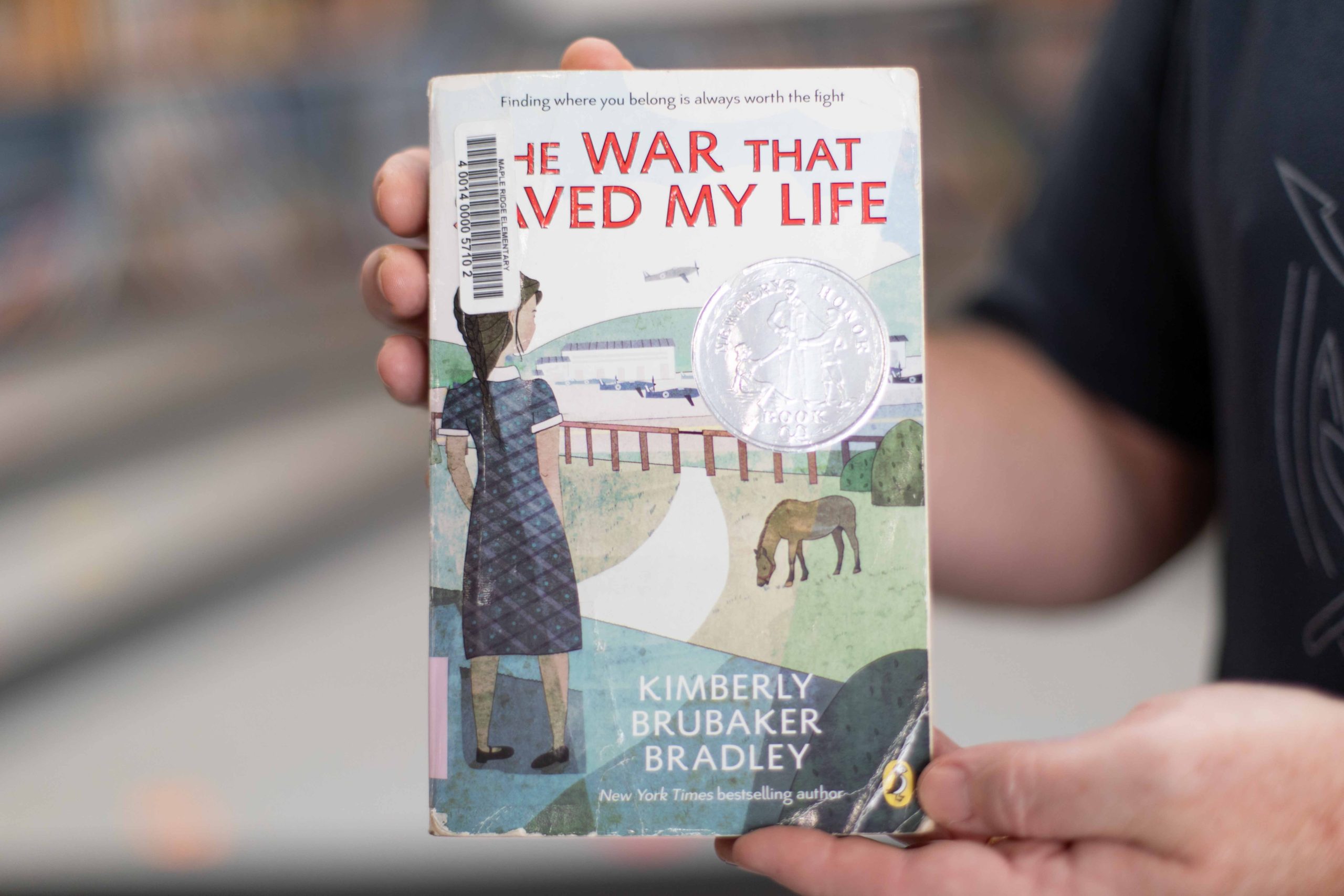 "The War That Saved My Life" by Kimberly Brubaker Bradley.  