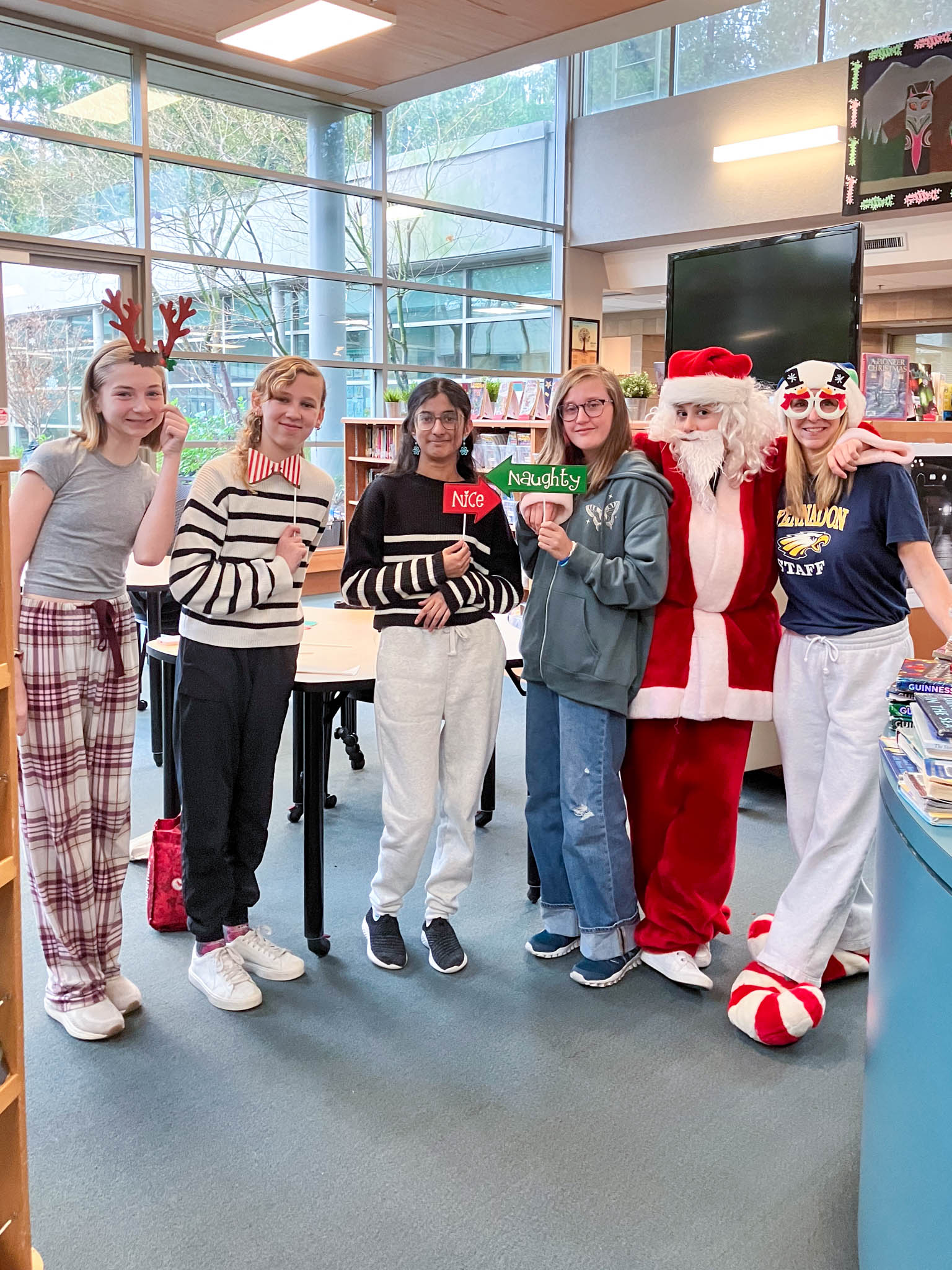 Yennadon Elementary student leadership team is ready for their Santa photos fundraiser along with teacher-librarian Candace White. 